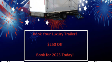 A trailer with fireworks in the background and a red white blue sky